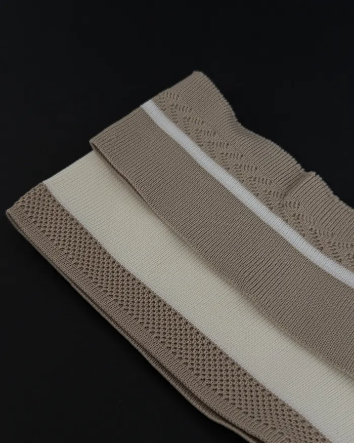 Detalle de franjas tejidas en beige, marfil y marrón